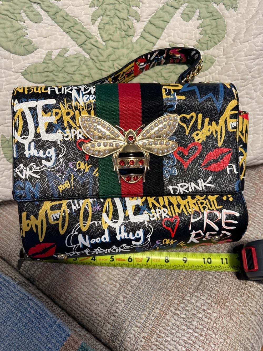 Black Graffiti-Print Tote with Red & Green Stripe and Bee Accent .